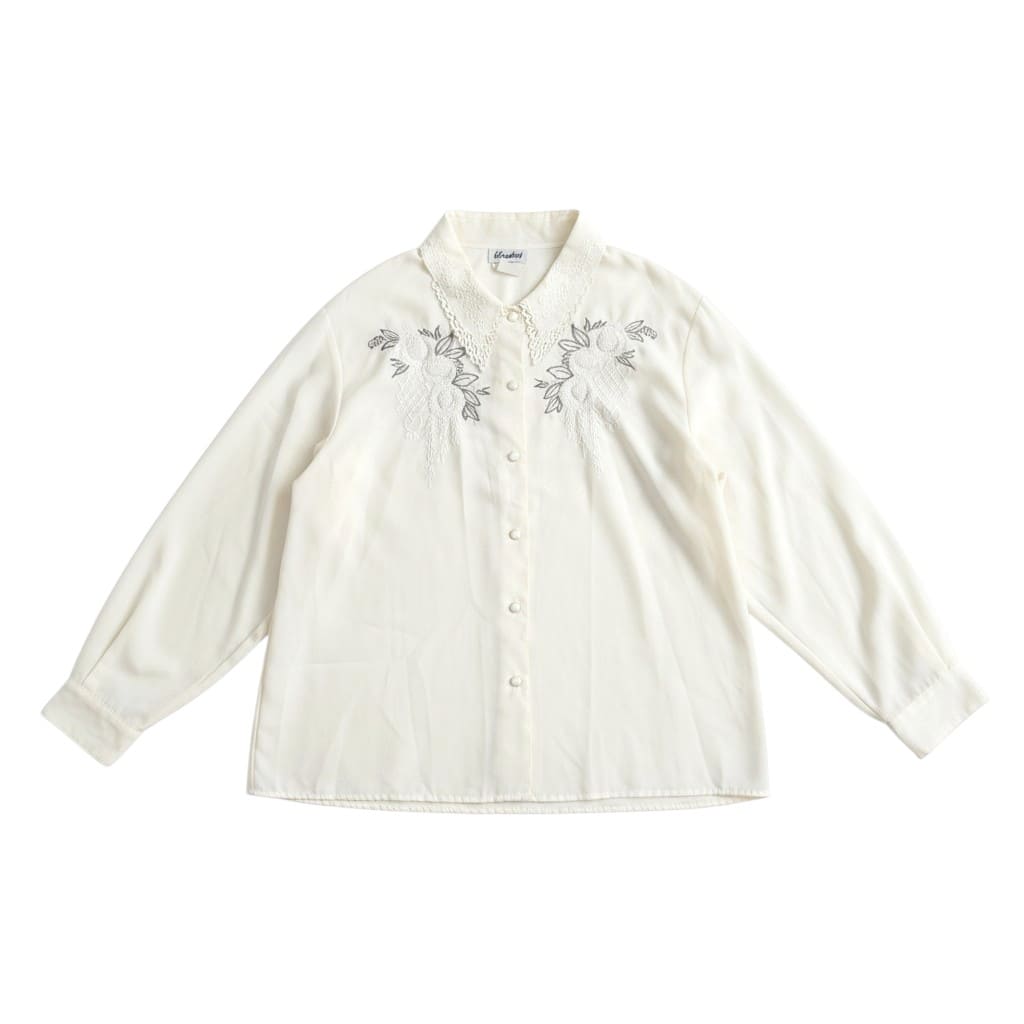 BLOUSE CRÈME AVEC DÉTAILS LARGE