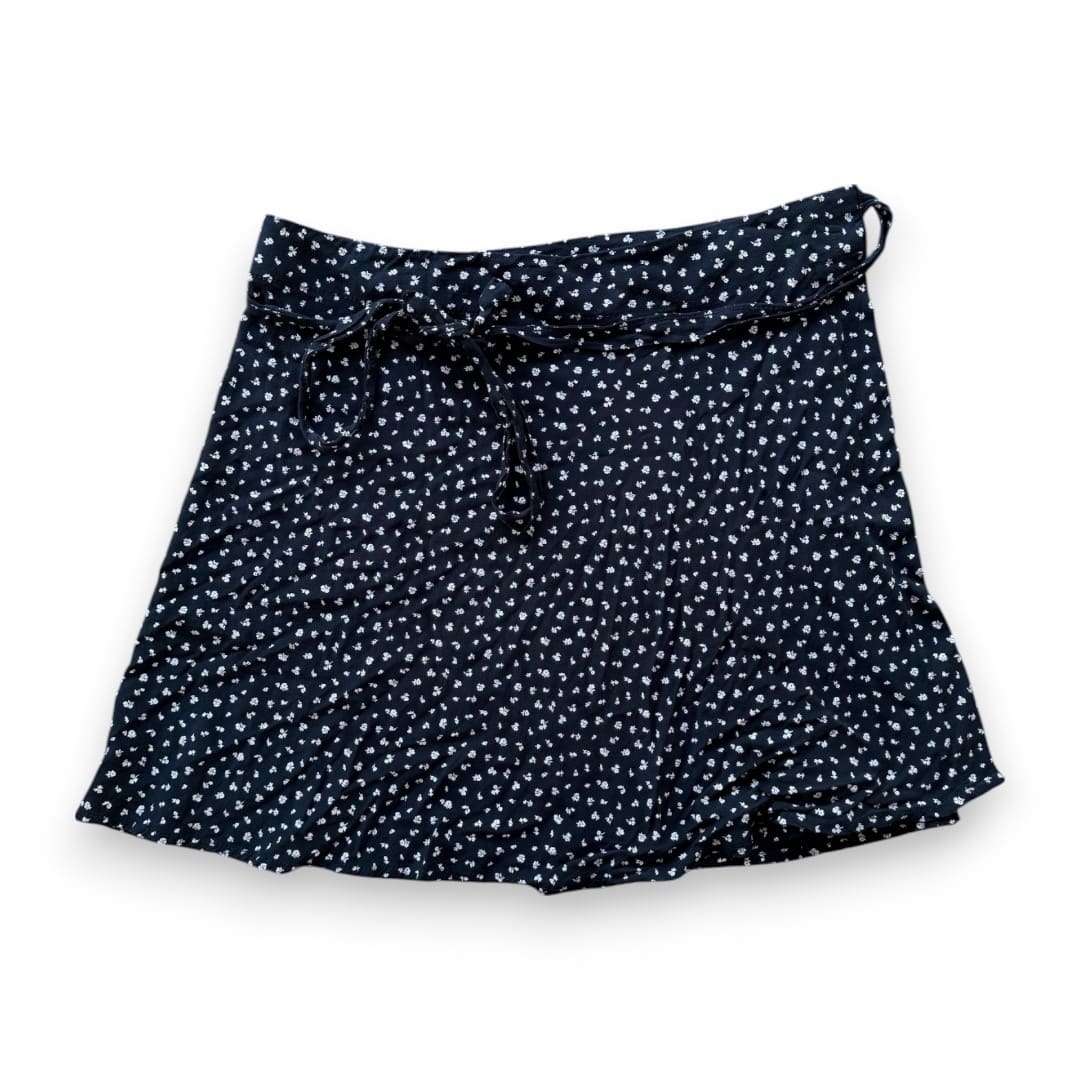 JUPE PORTEFEUILLE NOIRE AVEC FLEURS BLANCHES BRANDY MELVILLE SMALL