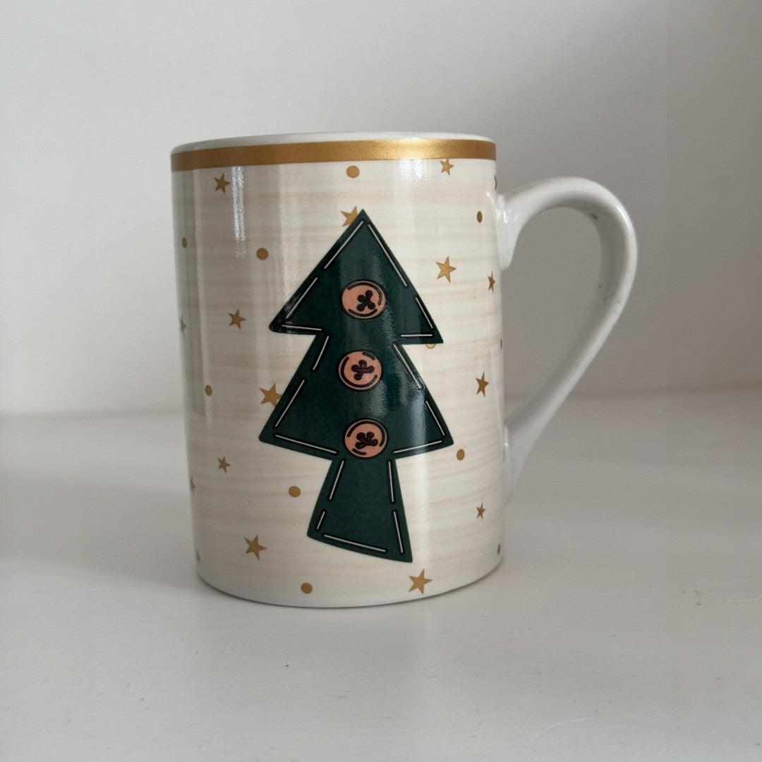 TASSE DE NOEL OR ET BLANC AVEC UN SAPIN